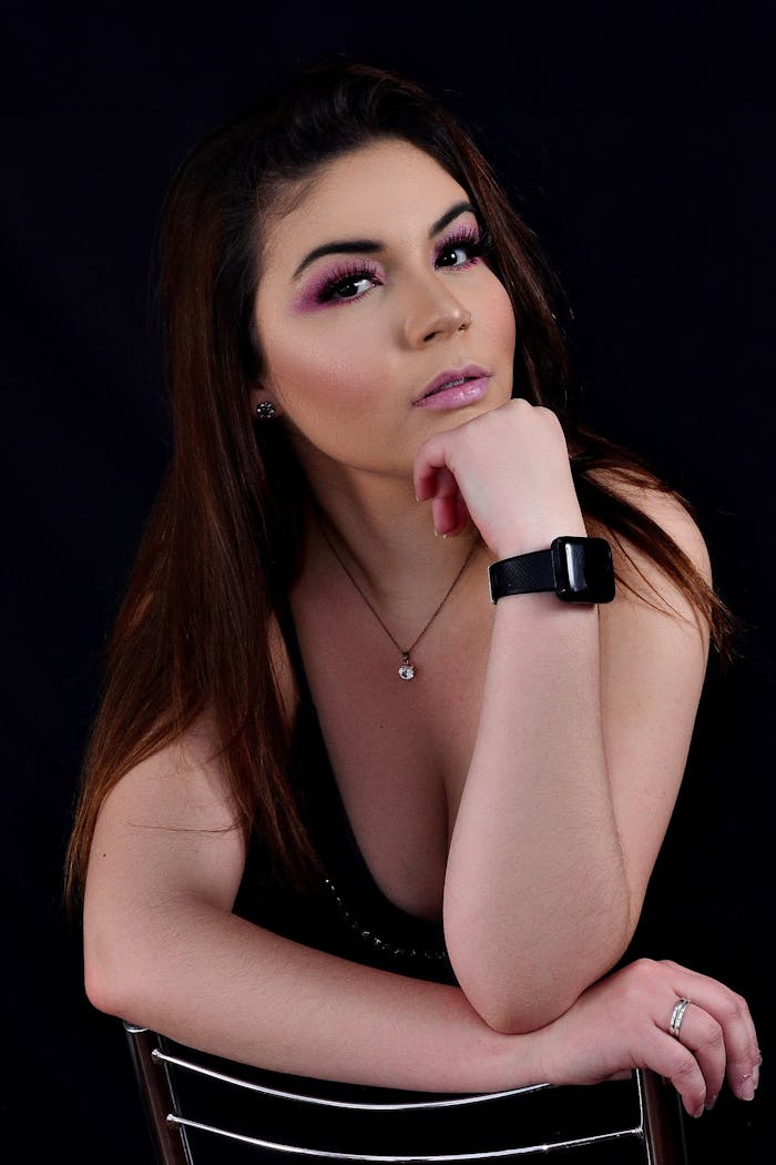 Portrait of a confident woman with elegant jewelry, highlighting fashion and style.